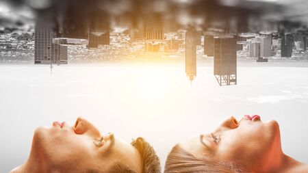 Profiles of girlfriend and boyfriend giving each other air kiss