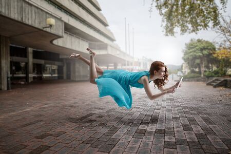 When reading takes you away. Mixed mediaの写真素材