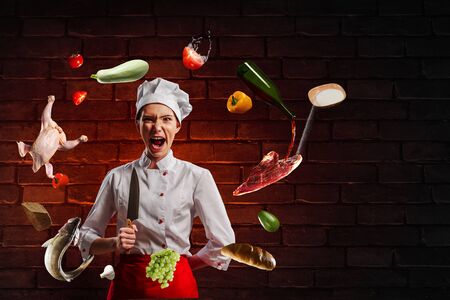 He is crazy about cooking. Mixed mediaの写真素材