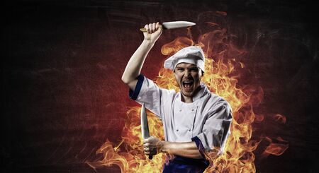 He is crazy about cooking. Mixed mediaの写真素材