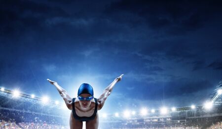 Swimmer at competition. Mixed mediaの写真素材