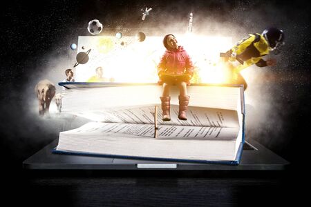 Reading a fairytale. Mixed mediaの写真素材