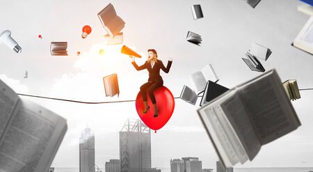 Mime woman in black suit and red balloons. Mixed mediaの写真素材