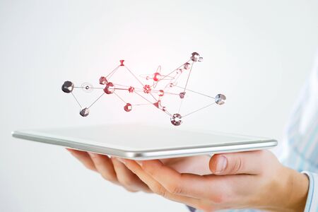 Global networking concept with lines from tabletの写真素材