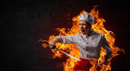 He is crazy about cooking. Mixed mediaの写真素材