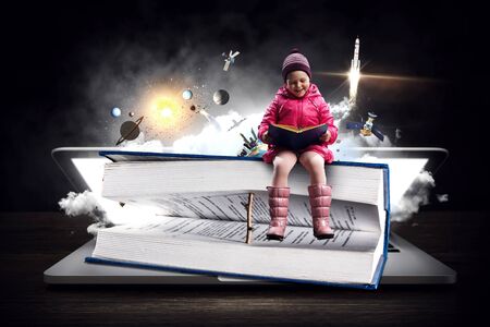 Reading a fairytale. Mixed mediaの写真素材