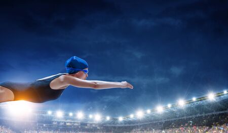 Swimmer at competition. Mixed mediaの写真素材