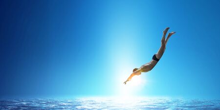 Swimmer in jump. Mixed mediaの写真素材