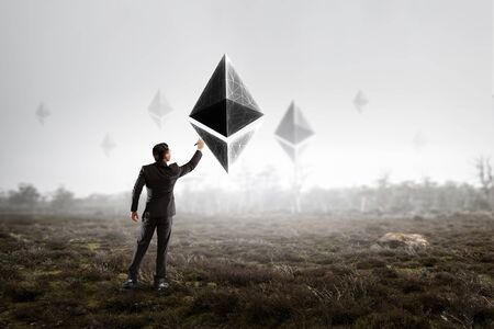 Ethereum crypto currency sign. Mixed mediaの写真素材
