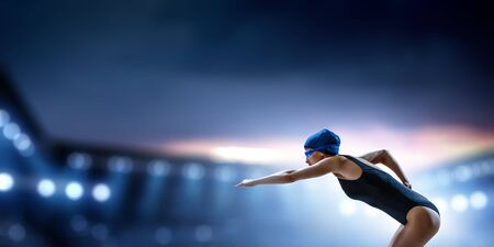 Swimmer at competition. Mixed mediaの写真素材