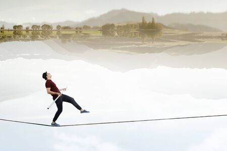Brave ropewalker on cable. Mixed media