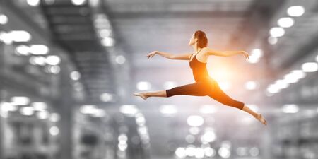 Gymnast girl in jump Mixed mediaの写真素材