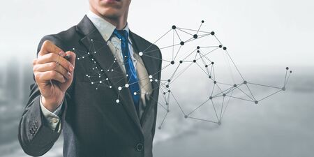 Young businessman against modern cityscape and connection concept. 3d renderingの写真素材