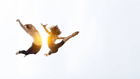 Couple of gymnasts dancing together. Mixed media