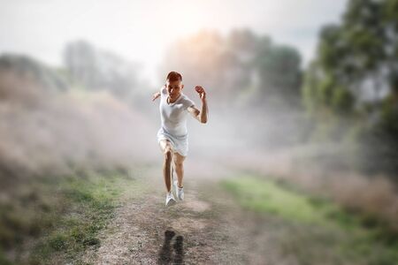 Sportsman running race. Mixed mediaの写真素材