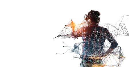 Experiencing virtual technology world. Mixed mediaの写真素材