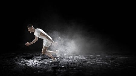 Sportsman running race. Mixed mediaの写真素材