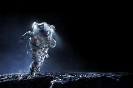 Spaceman running fast. Mixed mediaの写真素材