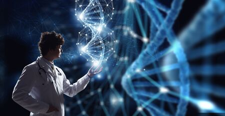 Young man doctor using new media technologies. 3d renderingの写真素材
