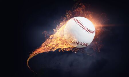Baseball ball in fire flames flying in airの写真素材