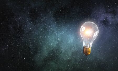 Glowing light bulb as creative idea conceptの写真素材