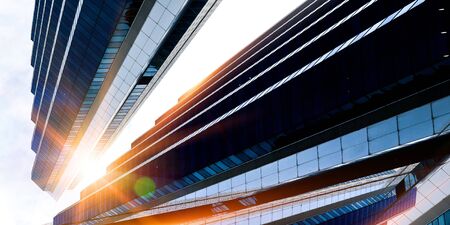 Bottom angle view of glass blue buildingの写真素材