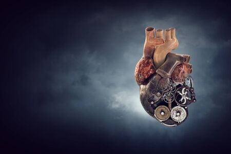 Human heart made of mechanisms and elements. Mixed media