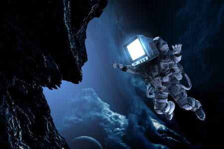 Astronaut with TV head in space. Mixed media.