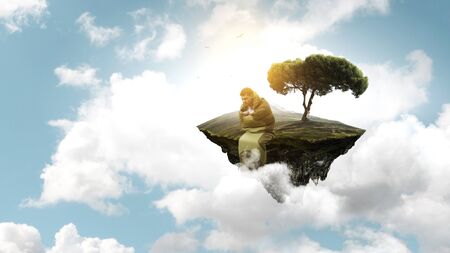 Young traveler in sleeping bagの写真素材