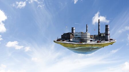 Industrial power plant with smokestack