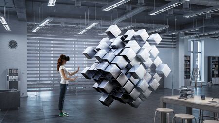 Woman wearing virtual reality goggles. Mixed mediaの写真素材