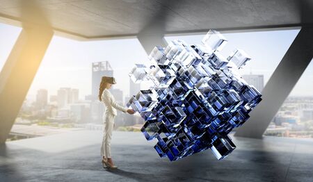 Woman wearing virtual reality gogglesの写真素材