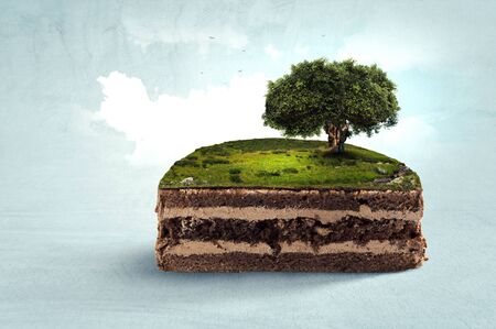 Cake with green landscape on top of it. Mixed mediaの写真素材