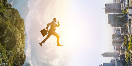 Running black businessman with briefcase