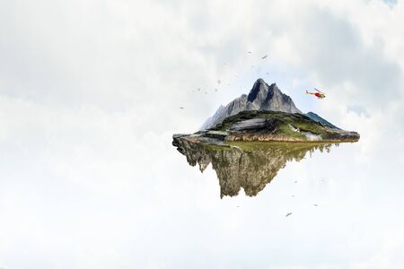 Landscape with mountain floating in the airの写真素材