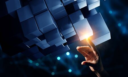 Hand holding glowing cubes. Innovation and creativity concept.