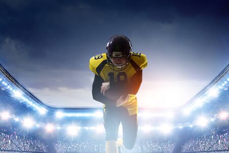 Portrait of confident American football playerの写真素材
