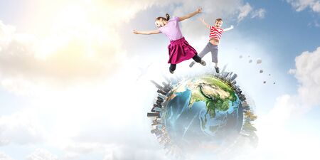 Cute happy little children jumping. Mixed media