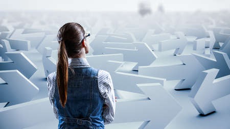 Business woman and maze . Mixed mediaの写真素材