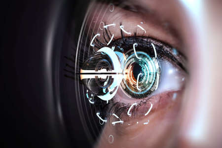 Close up of woman eye in process of scanning