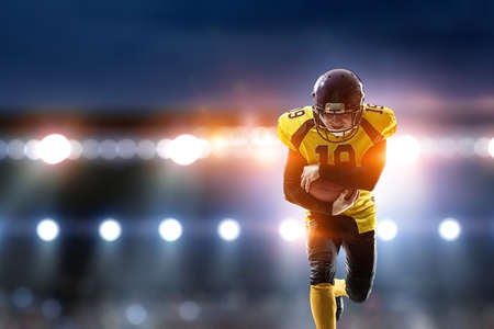 Portrait of confident American football playerの写真素材