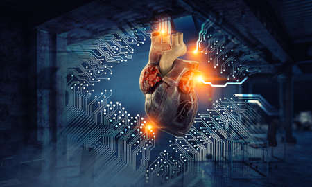 Image of human heart made of metal elementsの写真素材