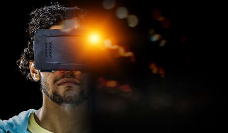Man wearing virtual reality gogglesの写真素材