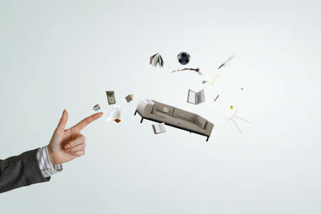 Man hand pointing at sofaの写真素材