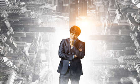 Young confident businessman . Mixed mediaの写真素材