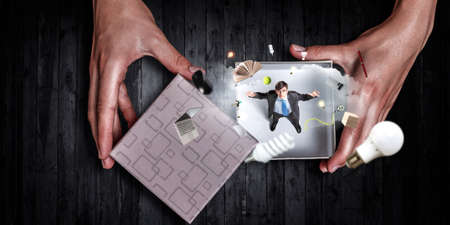 Businessman inside a box . Mixed mediaの写真素材