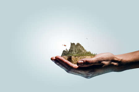 Mountain with snow top in handsの写真素材