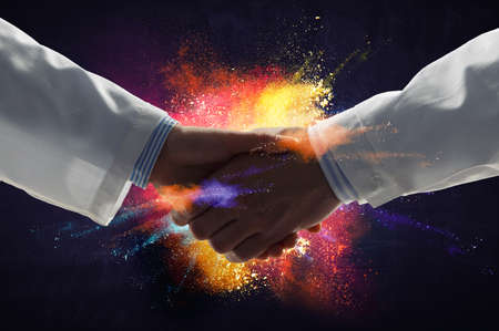 Partnership concept. Image of handshake