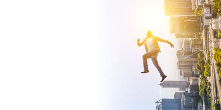 Black man in casual clothes in motionの写真素材