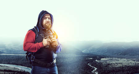 Travelling tourist with his backpackの写真素材